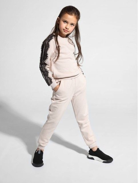 Joggers MINI ORA with a slight shimmer of lurex