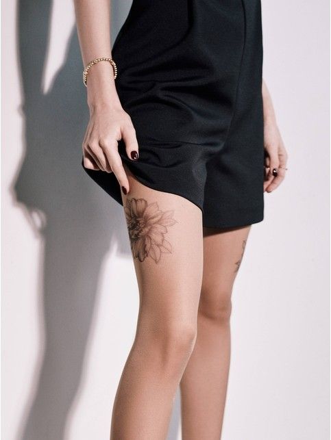 Limited tights with a peony tattoo pattern 